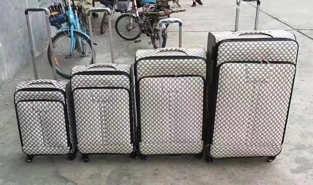 गर्म बिक्री थोक 20/24/28 इंच पीयू चमड़े का सफेद सूटकेस रोलिंग सामान सेट