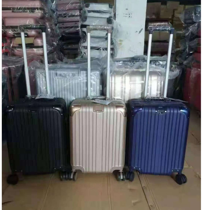 नई नवीनतम यात्रा सूटकेस ABS+PC यूनिवर्सल व्हील ज़िपर ट्रॉली बॉक्स ड्रैगिंग लेदर बॉक्स कोड बॉक्स सामान थोक