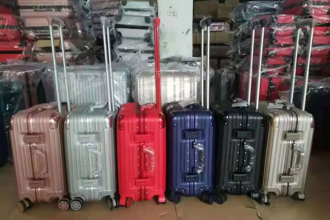 नई नवीनतम यात्रा सूटकेस ABS+PC यूनिवर्सल व्हील ज़िपर ट्रॉली बॉक्स ड्रैगिंग लेदर बॉक्स कोड बॉक्स सामान थोक