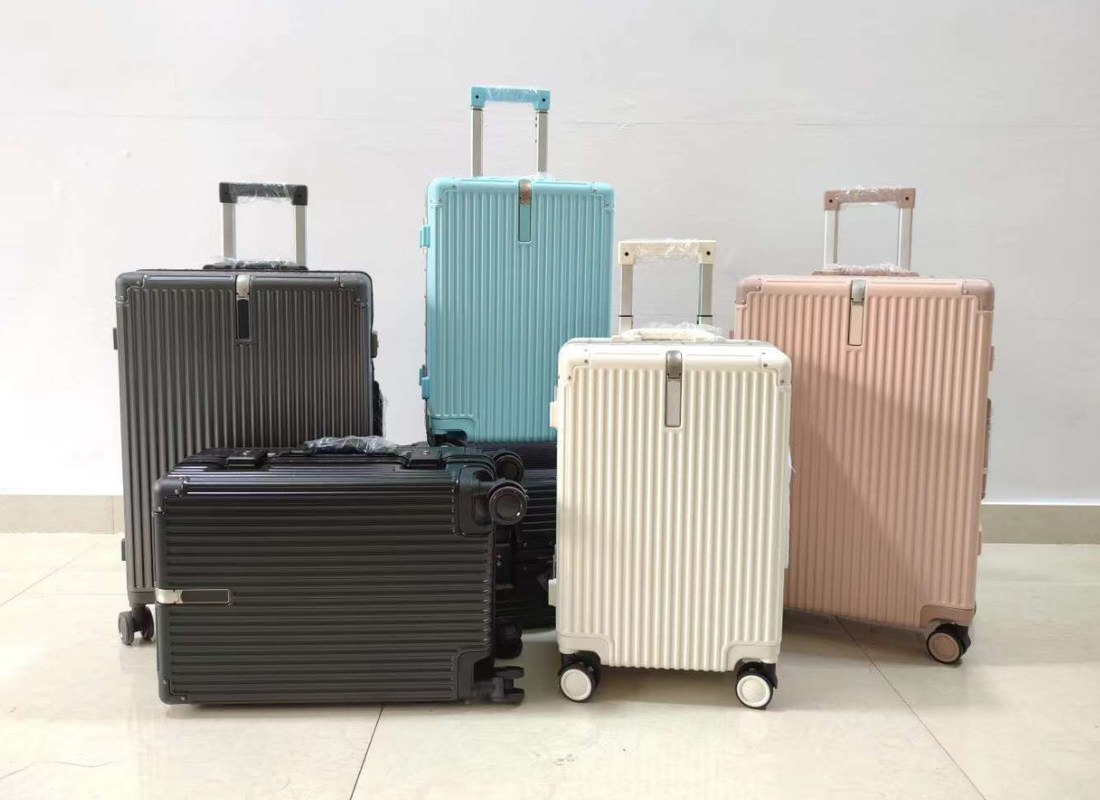 केबिन केस व्यापार यात्रा सामान 20 24 इंच पोर्टेबल एबीएस यूनिसेक्स एल्यूमीनियम फ्रेम सूटकेस