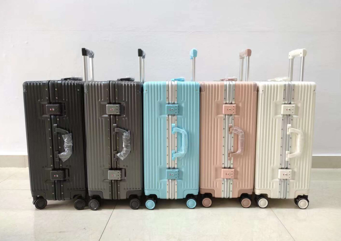 केबिन केस व्यापार यात्रा सामान 20 24 इंच पोर्टेबल एबीएस यूनिसेक्स एल्यूमीनियम फ्रेम सूटकेस